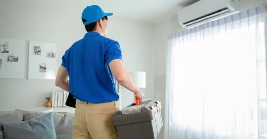 HVAC tech about to service unit